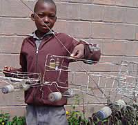 Mike Dlamini from Pumula North in Bulawayo holds his "Marcopolo" bus 