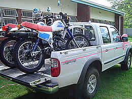 Motorvehicle and two motorcycles donated to the SAHRIT child rights project in Murehwa.
