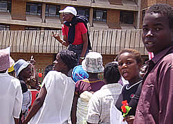 Magodonga Mahlangu (with white cap) and members of WOZA out the Government offices in Bulawayo