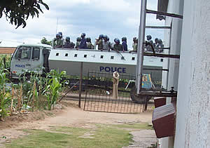 On high alert! Zimbabwean riot police patrol Highfield ater dispersing supporters of the MDC. The police have since announced a three-month ban on all public demonstrations and rallies to stem "possible political violence". © LAZELE 
