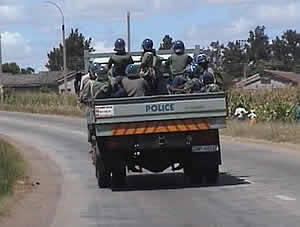 Zimbabwe riot police patrolling Highfield