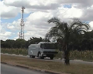 Zimbabwe riot police water tanker racing towards Highfield