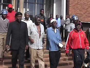 (From left to right) MDC faction leaders Professor Arthur Mutambara and Morgan Tsvangirai, NCA National Chairman Lovemore Madhuku and MDC's Tendai Biti