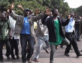 Supporters in solidarity with their colleagues as they arrive at the Rotten Row Magistrates Court