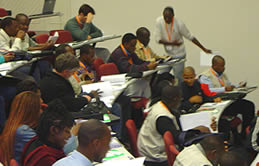 Delegates in a plenary session