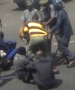 Wellington Chibebe is forced to the ground