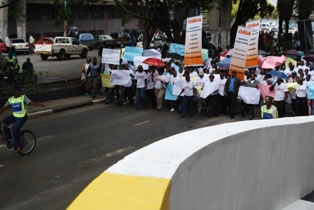 Police escort the demonstration