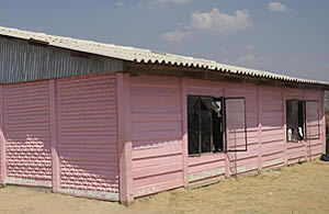 This is the Great Harvest Disciple Ministry Church also known as the 'Pink House'. During the week, the church is used as a pre-school