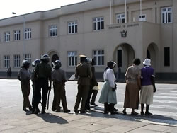WOZA representatives cross the street to present their petition against the NGO Bill to the Speaker and Members of Parliament