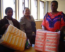 Members of the ZCTU hold some of the sanitary towels