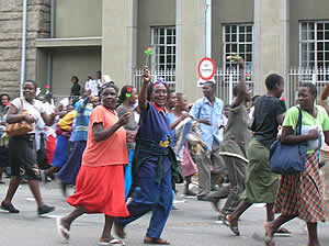 WOZA women - unstoppable, as they arrive at Parliament building