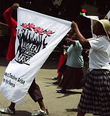Members of WOZA in Bulawayo marching with red roses in hand