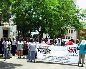 Choose Love Over Hate! WOZA members along Josiah Tongogara St near the Tower Block